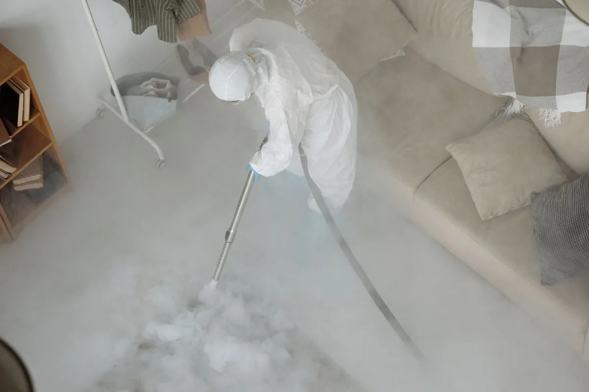 Biohazard cleanup technician in protective equipment, Prairie Heights, WA